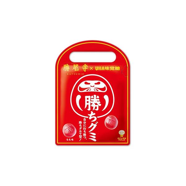Sachet de bonbons japonais porte-bonheur UHA-Mikakuto Daruma Shaped Lucky Gummy saveur pêche.