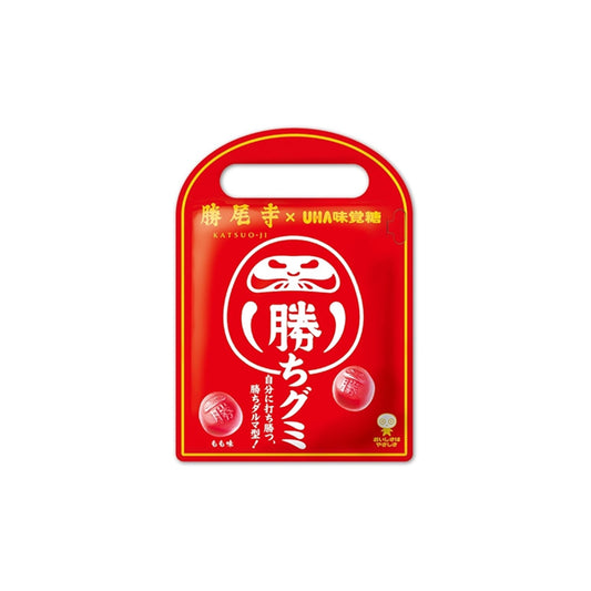 Sachet de bonbons japonais porte-bonheur UHA-Mikakuto Daruma Shaped Lucky Gummy saveur pêche.